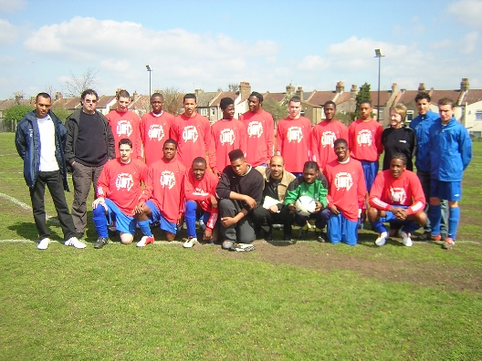 LOFT members pose with a cup-winning team from Leyton!